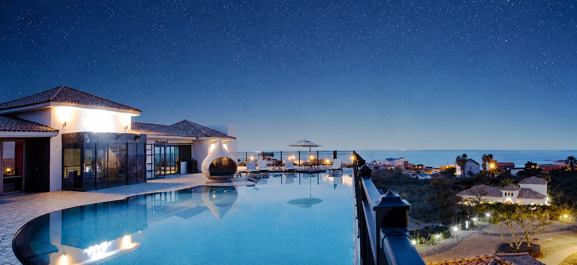 RITAMVILLE Jeju Village at night, under starlight and evening lights