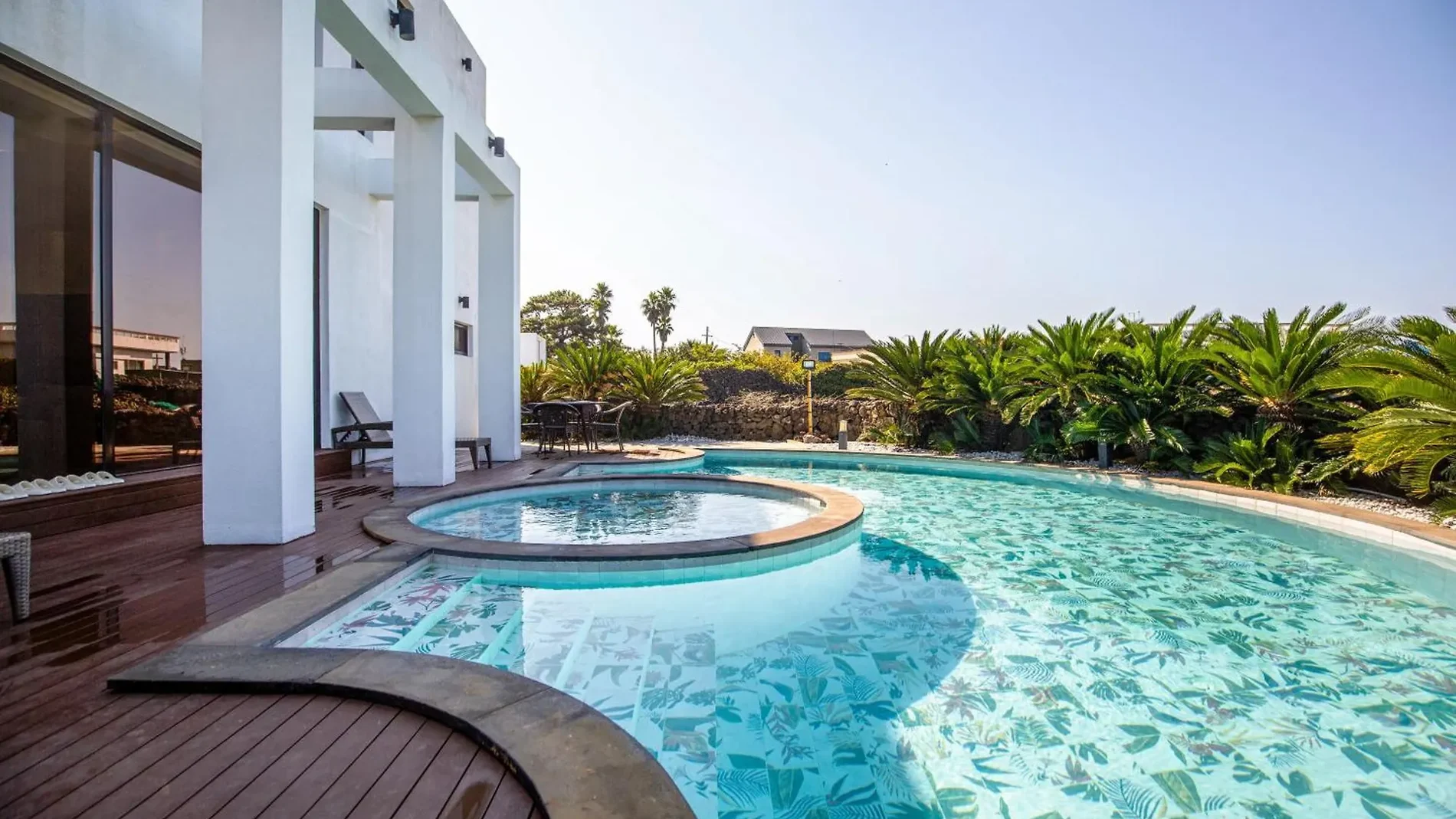 Pool and terrace in front of the pool villa